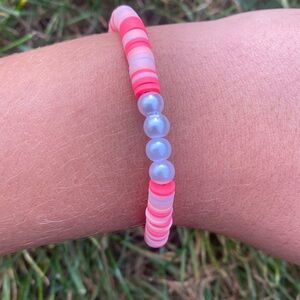 A handmade clay bead bracelet